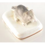 A rare Worcester miniature porcelain mouse, based chipped.