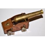 A handmade model of a cannon, late 19th early 20th century.