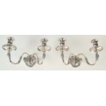 A pair of early 19th century European silver wall lights,