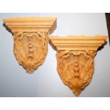 A pair of shell moulded plaster corbels.