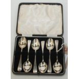 A set of six silver Old English pattern tea spoons each engraved with the letter 'J '.