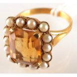 A 9ct. gold citrine and pearl ring.