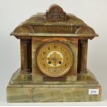 An onyx cased architectural mantle clock.