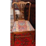 A late Georgian mahogany table on pedestal, tripod base and a Chippendale style dining chair.