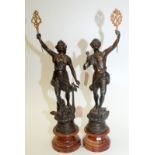 A pair of early 20th century French spelter figures representing Le Telephone and Le Telegraphe on