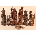 A collection of eastern carved wood figures etc.