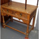 A light oak side table fitted with a single drawer in 17th century style.