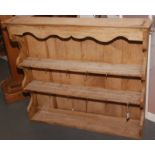 A rack of pine open shelves, width 103cm.