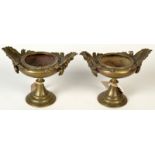 A pair of Regency bronze small urns.