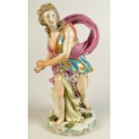A large 18th century Chelsea Derby figure of a classical woman with gilt and floral painted gowns,
