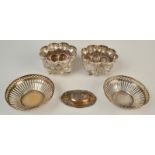 A pair of pierced sweetmeat baskets,