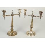 A pair of Victorian EPNS twin branch candelabra in classical revival style.