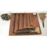 A display of nails recovered from the wreck of HMS Caroline,