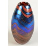 A Norman Stuart Clarke ovoid vase with iridescent and red spiral line decoration, height 16cm,