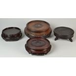 A large Japanese carved hardwood vase stand, diameter 24.