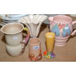 Five pieces of moulded Clarice Cliff pottery.