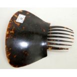 A tortoiseshell mantilla comb.