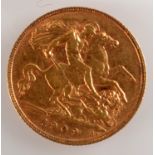 A George V half sovereign dated 1909, good, very fine.