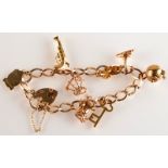 A 9ct gold charm bracelet with padlock clasp and eight charms, 25.2g.