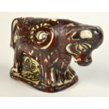 A Celtic Pottery bull with rare brown and black markings, height 12.5cm.