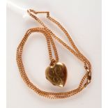 A 9ct. heart shaped locket and chain, 10.7g.