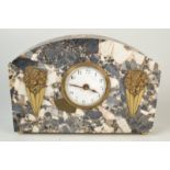 An Art Deco mantle clock in marble veneered case.