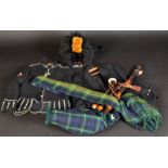 A set of London Scottish Regiment tartan bagpipes, a matching sash by Piob Mhor,