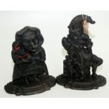 A pair of cast iron doorstops, Mr and Mrs Punch.