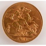 A George V sovereign dated 1913, extremely fine.