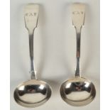 A pair of George IV plain fiddle pattern sauce ladles, 5oz.