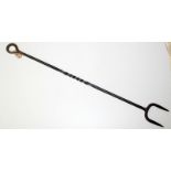 A wrought iron log fork, forge or farm implement, length 108cm.