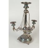 A Victorian table centre candelabrum, the three branches with winged griffins,