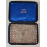 An engraved Victorian silver card case/notebook, Birmingham 1875,