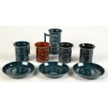 Three Portmeirion 'Jupiter' coffee cups and saucers and one tall mug,