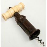 A 19th century Dowler type Patent corkscrew with a turned bone handle, lacks brush,