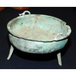 A Chinese bronze ding, 700BC, with twin handles,