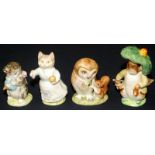 A Beatrix Potter figure "Tabitha Twitchit" and another "Miss Moppet" gilt marks,