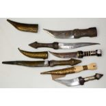 Six middle eastern daggers.