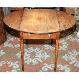 A Sheraton period, mahogany, small oval, Pembroke table with inlaid lines,