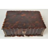 A silver mounted tortoiseshell box.