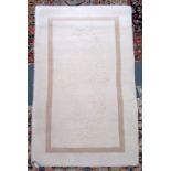 A Savonnerie style rug, 239 x 152cm and an Indian rug, 149 x 93cm.