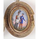 A late 19th century enamelled miniature showing a dragoon and another officer in a landscape, 2.