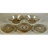 A pair of cut glass eliptical bowls each 27cm wide, together with eight matching 21cm plates.