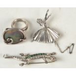 A paste set lizard brooch and a silver ballet dancer brooch designed by Frederick Massingham and