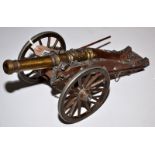 A replica model of a Louis XIV cannon.