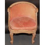 A small French carved wood Empire style chair, together with a similar dining chair.