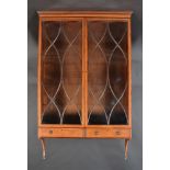 An exceptional Hepplewhite period satinwood wall cabinet, crossbanded and with inlaid lines,