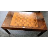 A mahogany games table, with reversible games board