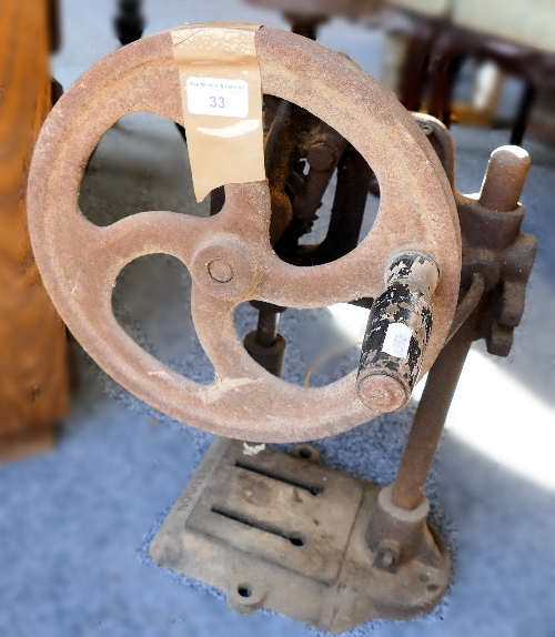 An early hand powered pillar drill and shoe last's