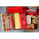 A box of biscuit tins/money boxes, in the form of buses